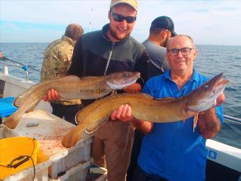 7 lb 10 oz Ling (Common) by Ben from Ripon (left)