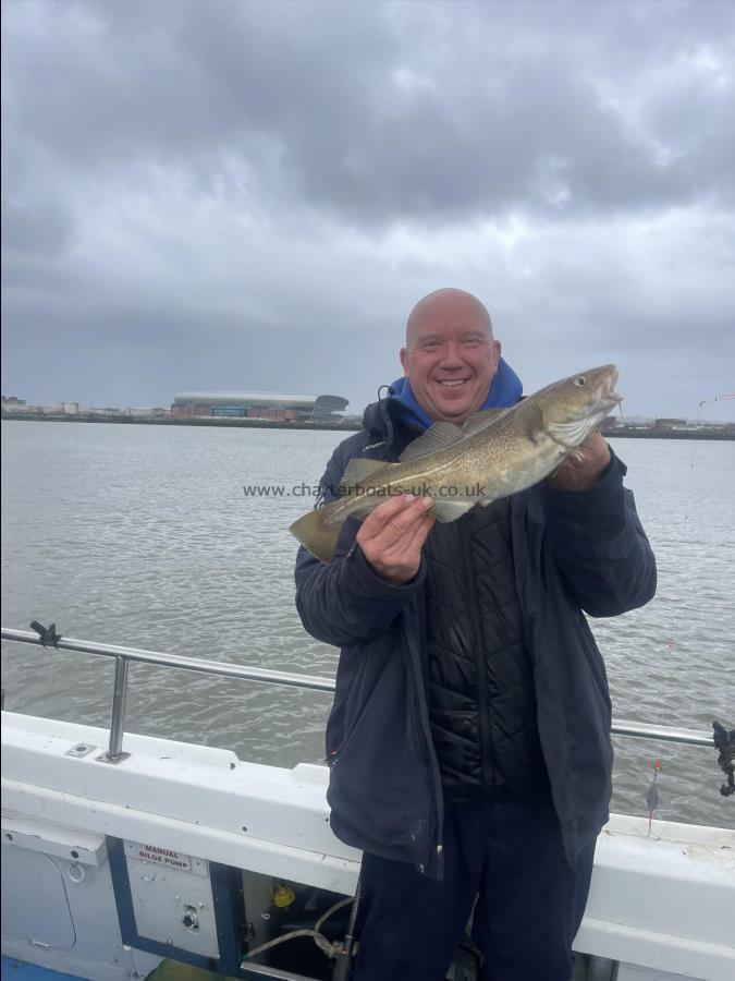 3 lb Cod by Skipper with a Cod