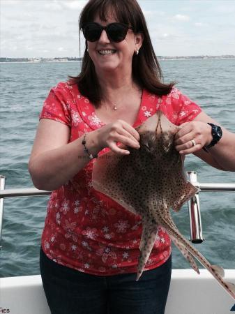 2 lb 7 oz Spotted Ray by Claire's first ray!