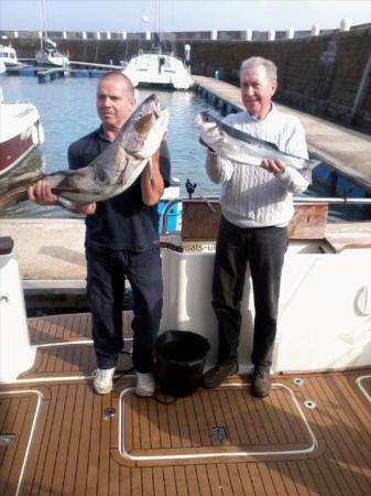 4 lb 8 oz Bass by John (on right)