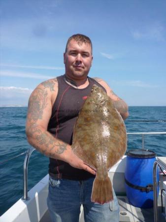 4 lb 13 oz Plaice by Wayne Frapple