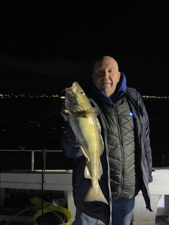 3 lb Cod by Skipper with his Cod