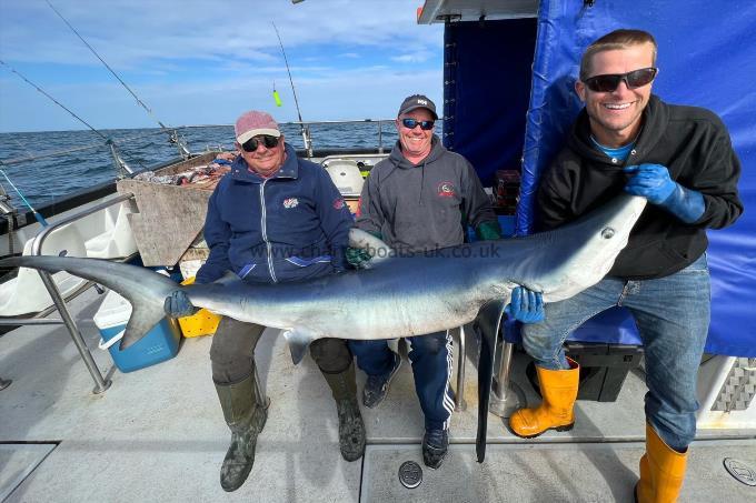 134 lb Blue Shark by Wayne Bennett caught on our trip to Guernsey